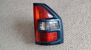 KW-E-061-RH NIQ | FAROL TRAS MITSUBISHI DID 01-02 RH NIQ