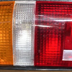 81550-89166-TYC | FAROL TRAS HILUX 89-95 RH